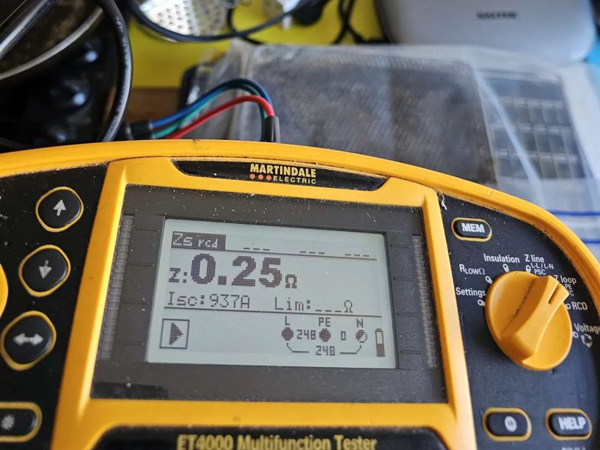 Electrician testing a consumer unit