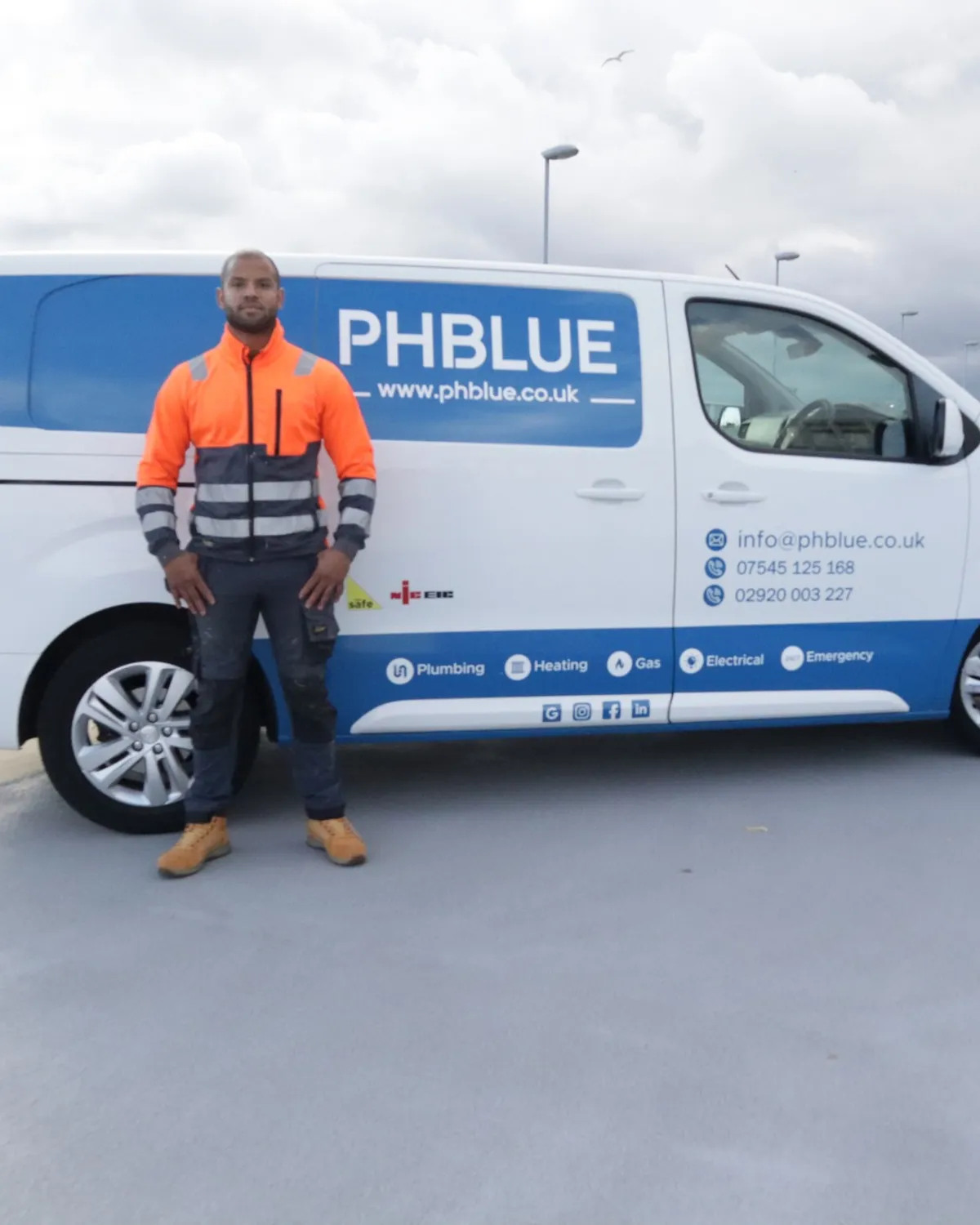 Nigel Phillips beside the PHBLUE van in Cardiff