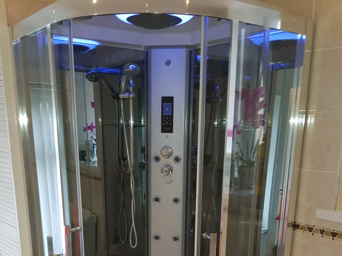 Shower cabin being installed